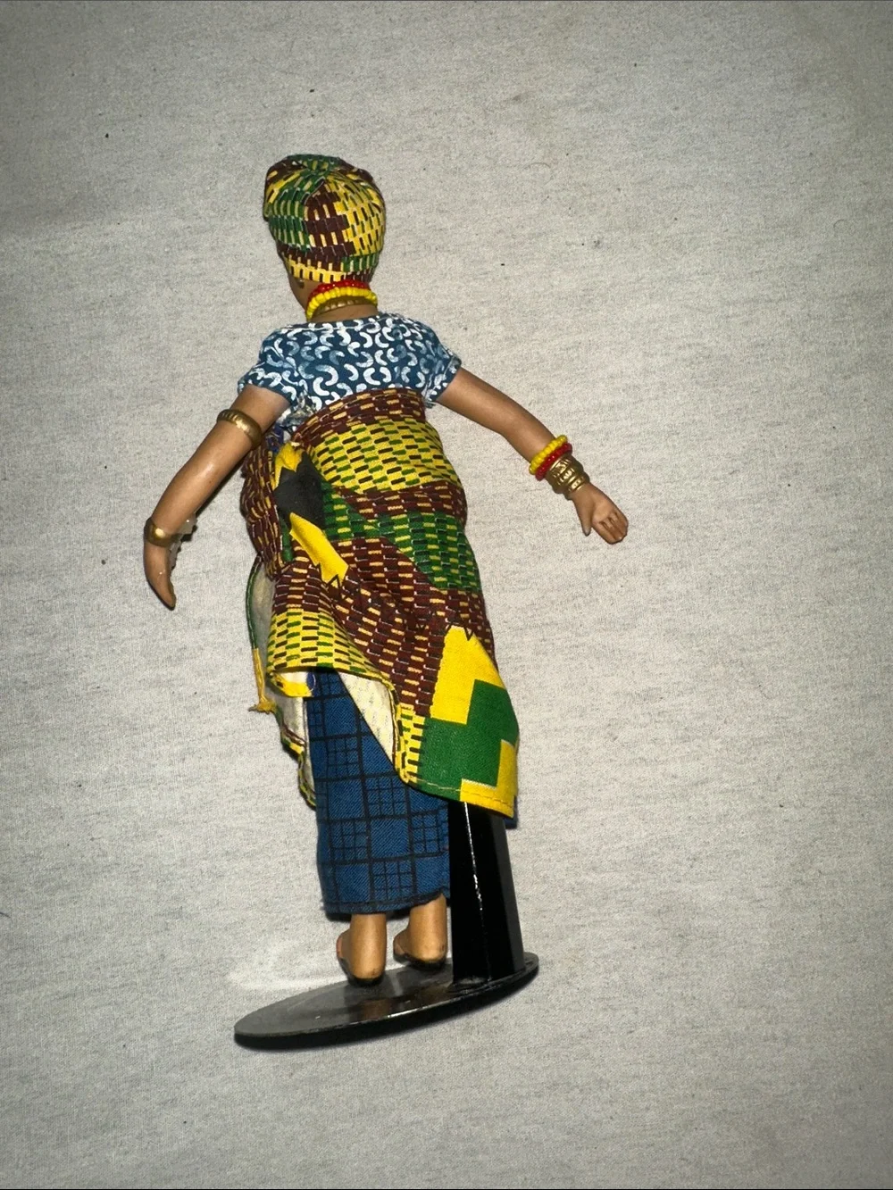 Handmade African Cloth Porcelain Doll in Vibrant Yellow, Blue & Green